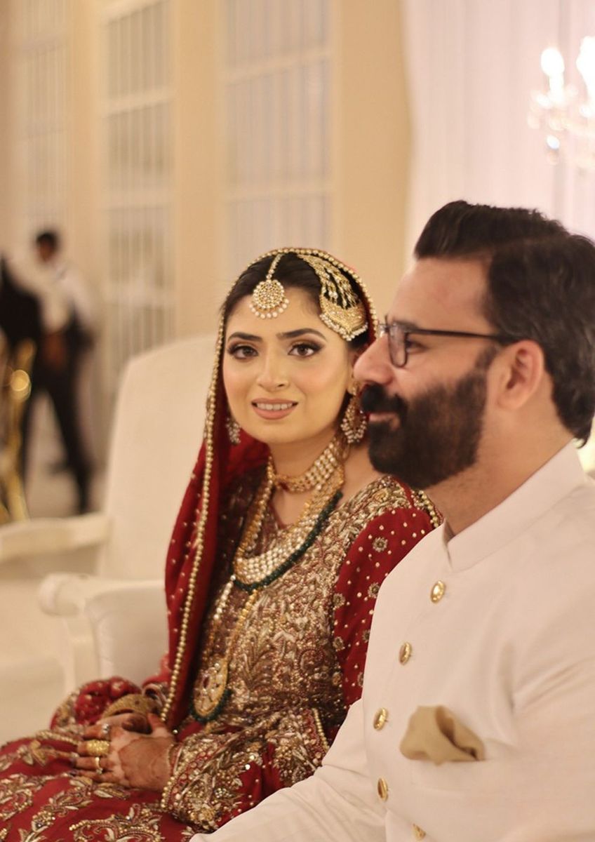 Bride and groom seated
