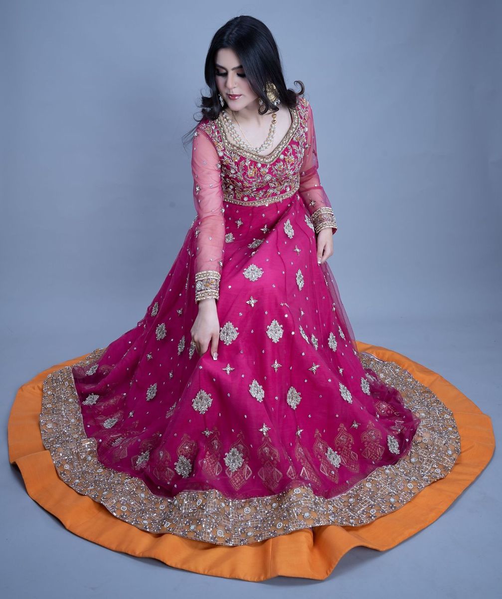 Bride in a fuchsia flared gown