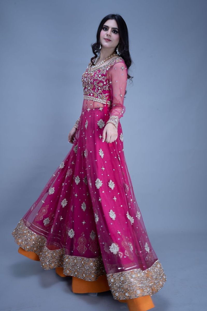 Bride in a fuchsia flared gown