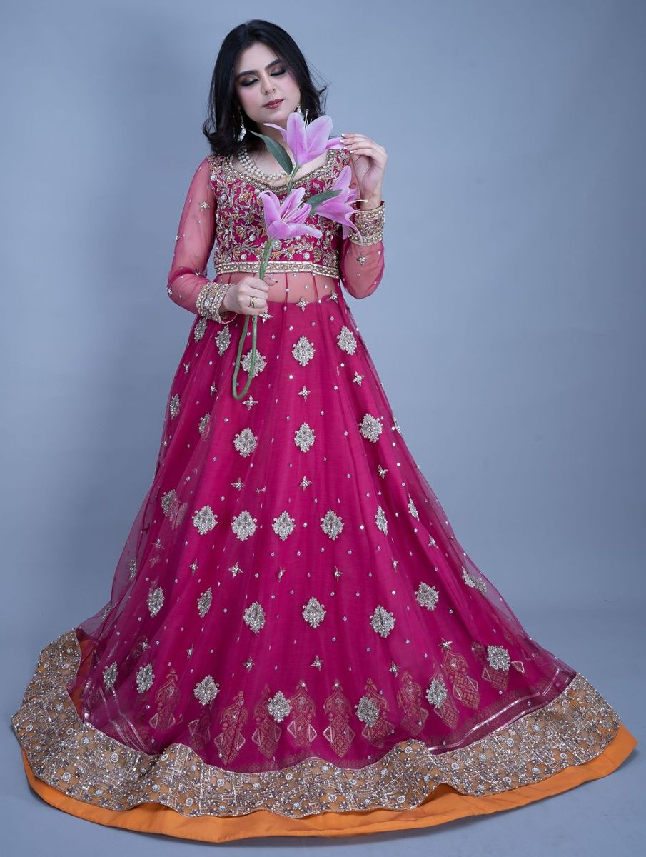 Bride in a fuchsia flared gown