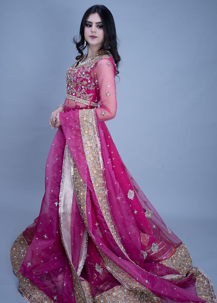 Bride in a fuchsia flared gown