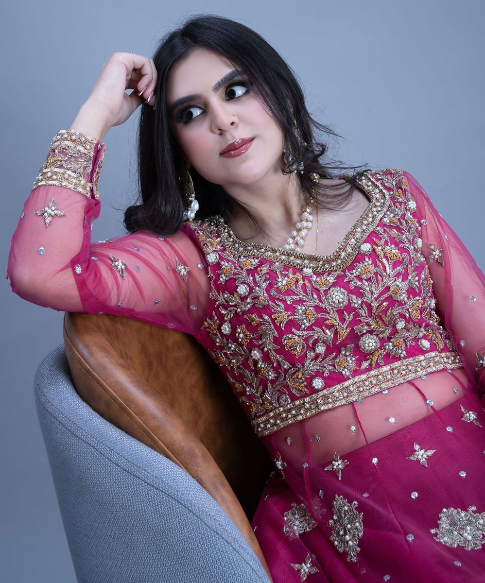 Bride in a fuchsia flared gown