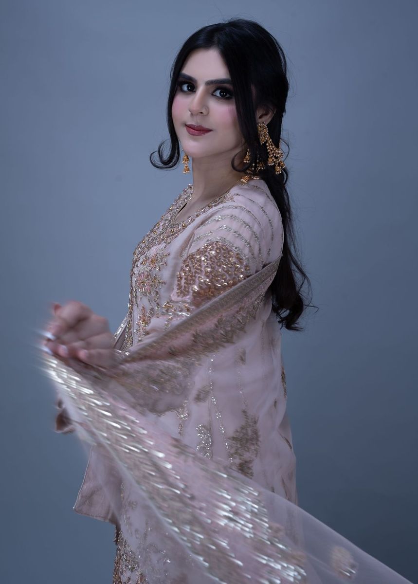 Formal portrait in blush and gold
