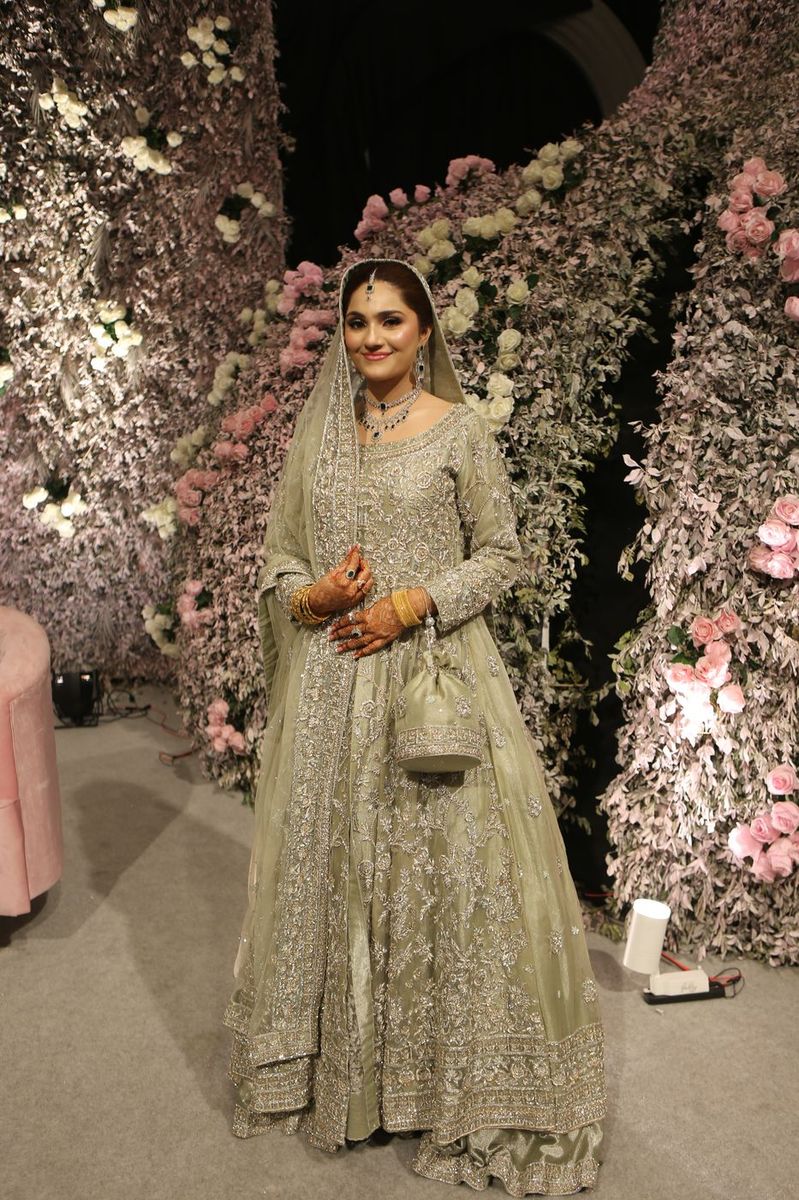 Bride in a sage-green gown