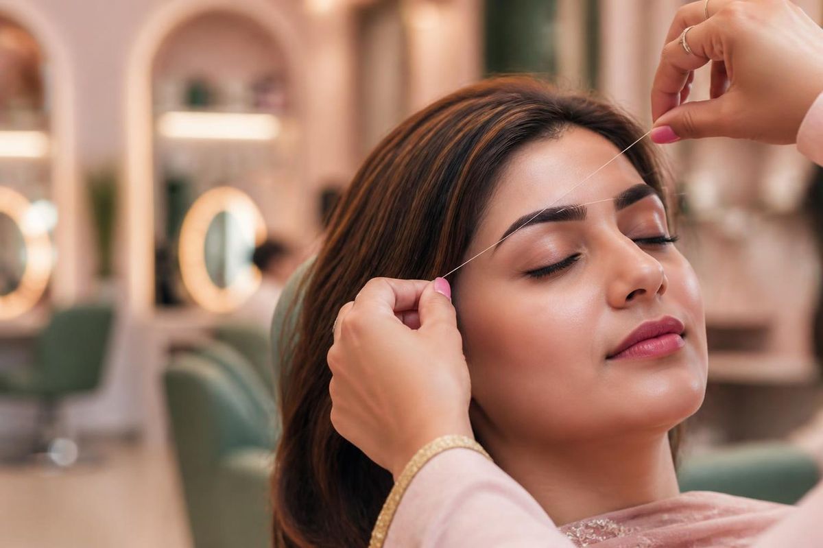 Eyebrow threading at Aini's Salon